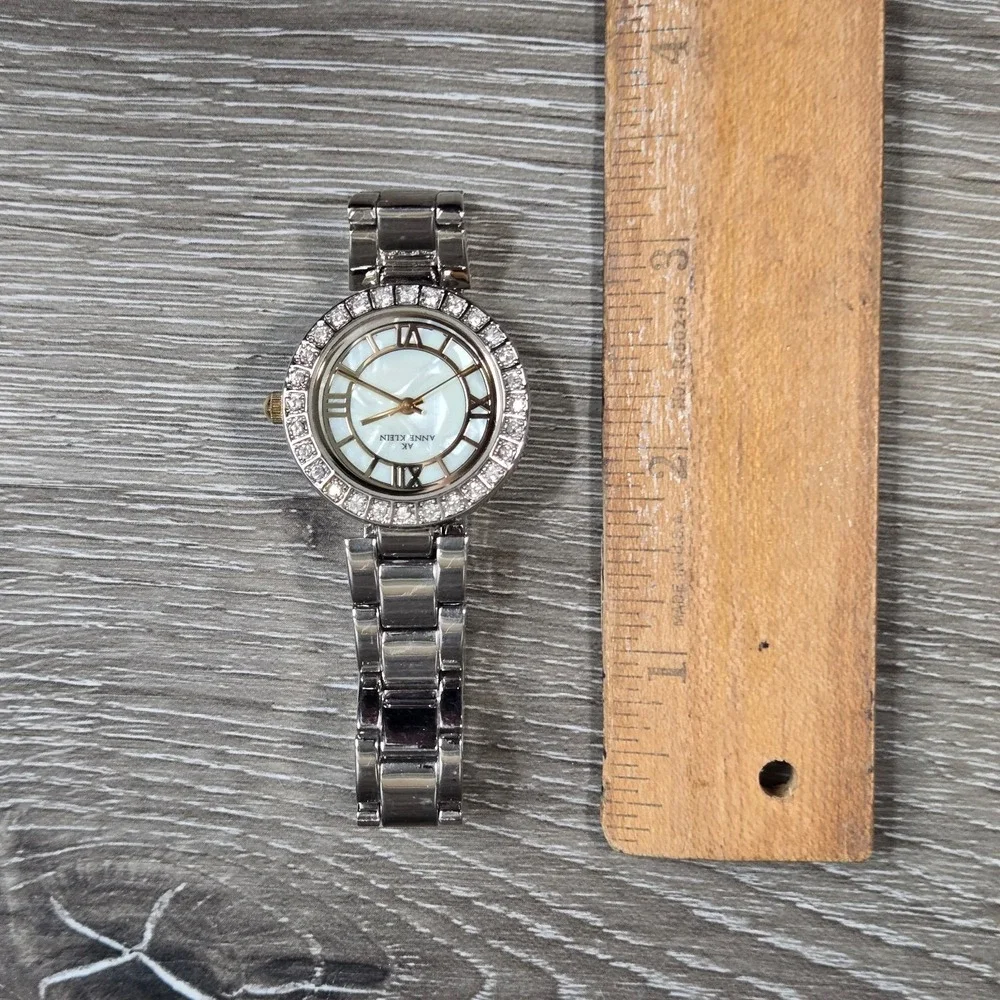 Anne Klein Women's Mother Of Pearl Women's Quartz Watch10/8671 silver tone S5.5